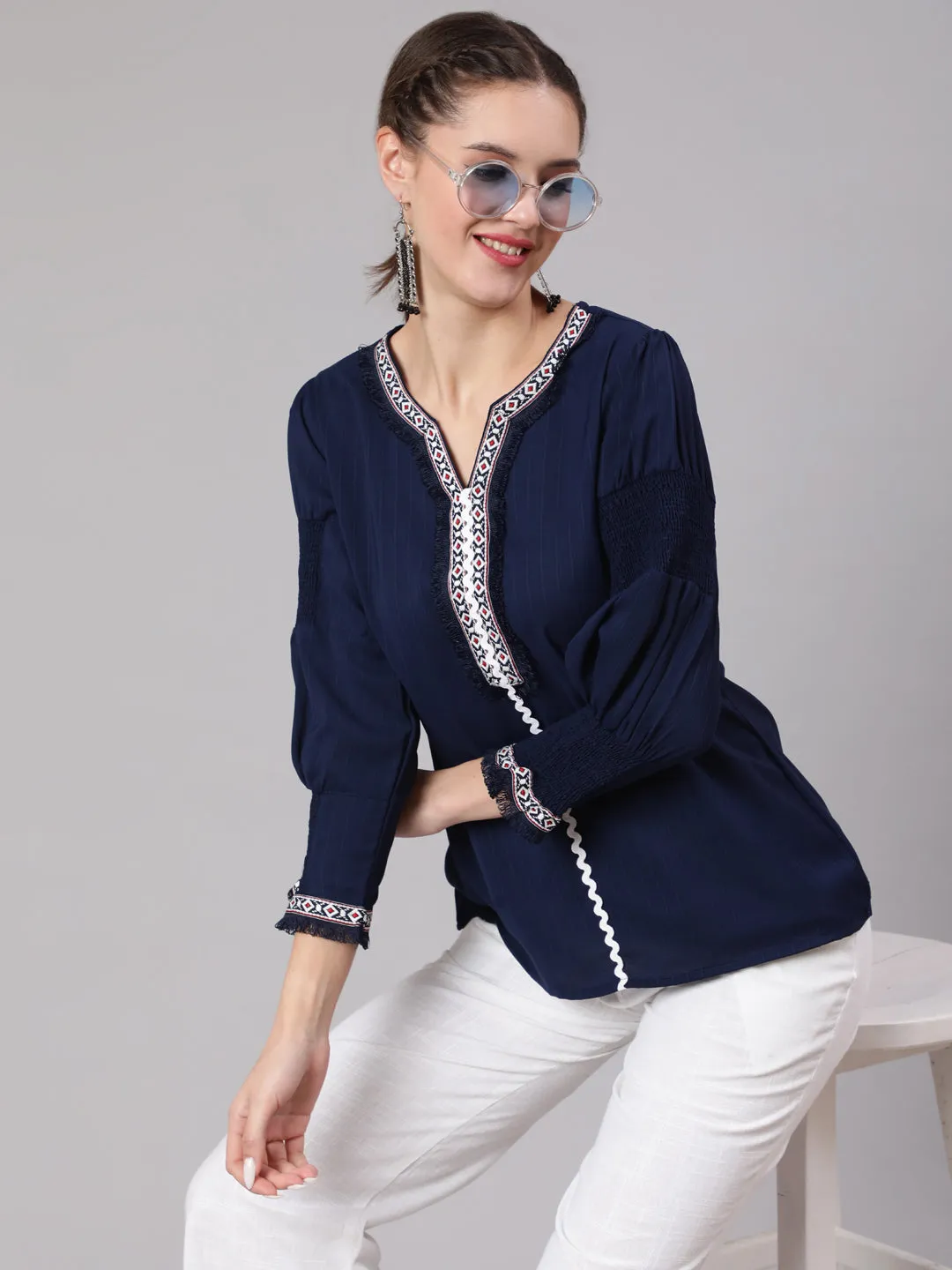 A Blue Poly Silk Lace Embellished Top With Smocked Sleeves With Wide-Leg White Pants