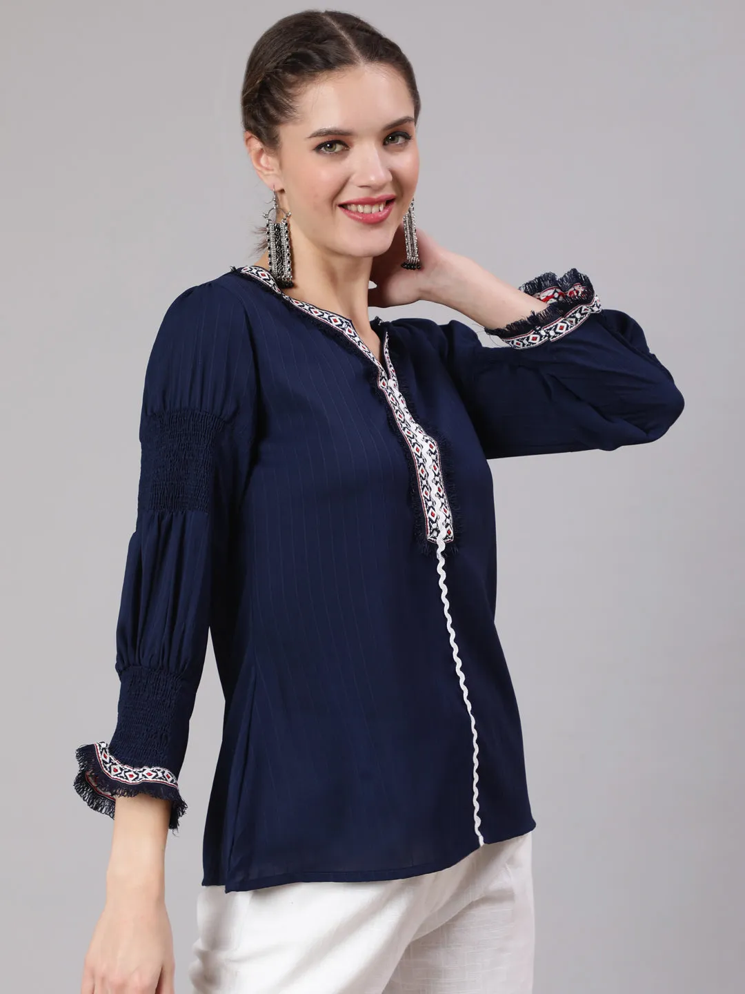 A Blue Poly Silk Lace Embellished Top With Smocked Sleeves With Wide-Leg White Pants